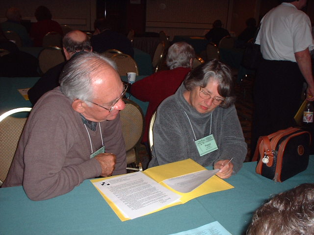 Mel and Peggy Rosen review the contents of their folder